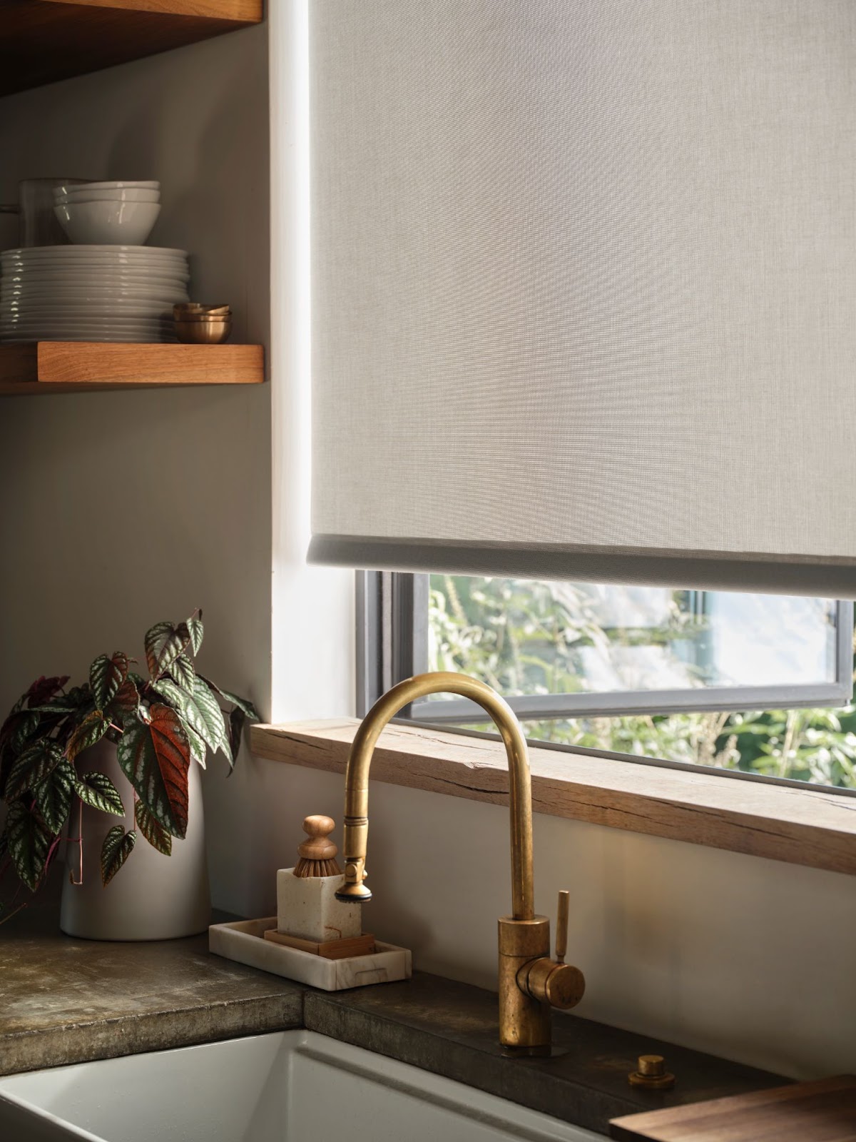 sunbrella window treatment shades in a kitchen