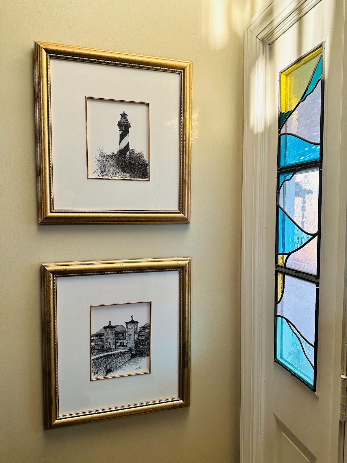 stained glass window pain and gold wall art  in a Chattanooga home.