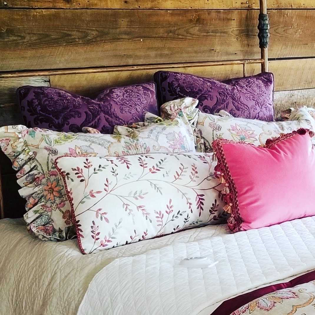 custom purple and floral bed pillows  in a Chattanooga home.